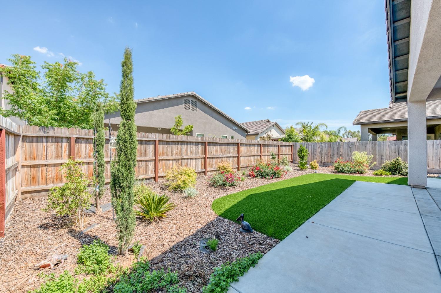 1729 North Carson Avenue Clovis, CA 93619 - Photo 28 of 38 a view of a street with a house in the background