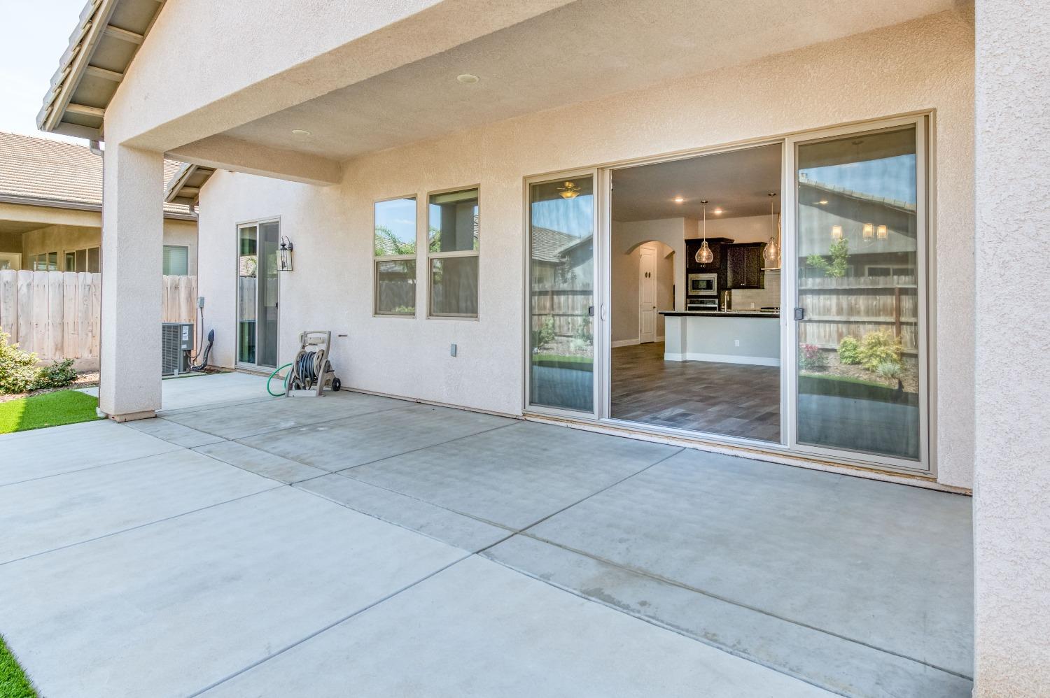 1729 North Carson Avenue Clovis, CA 93619 - Photo 32 of 38 a view of livingroom with dining area