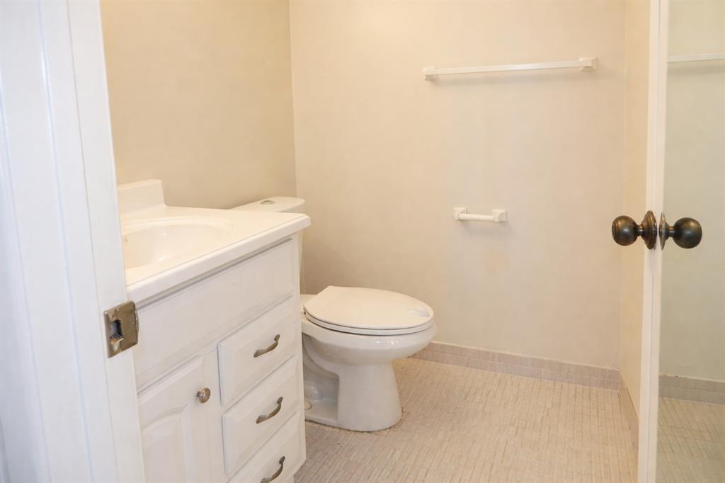 5300 Washington Street, Unit 107D Hollywood, FL 33021 - Photo 12 of 23 a bathroom with a toilet and a shower