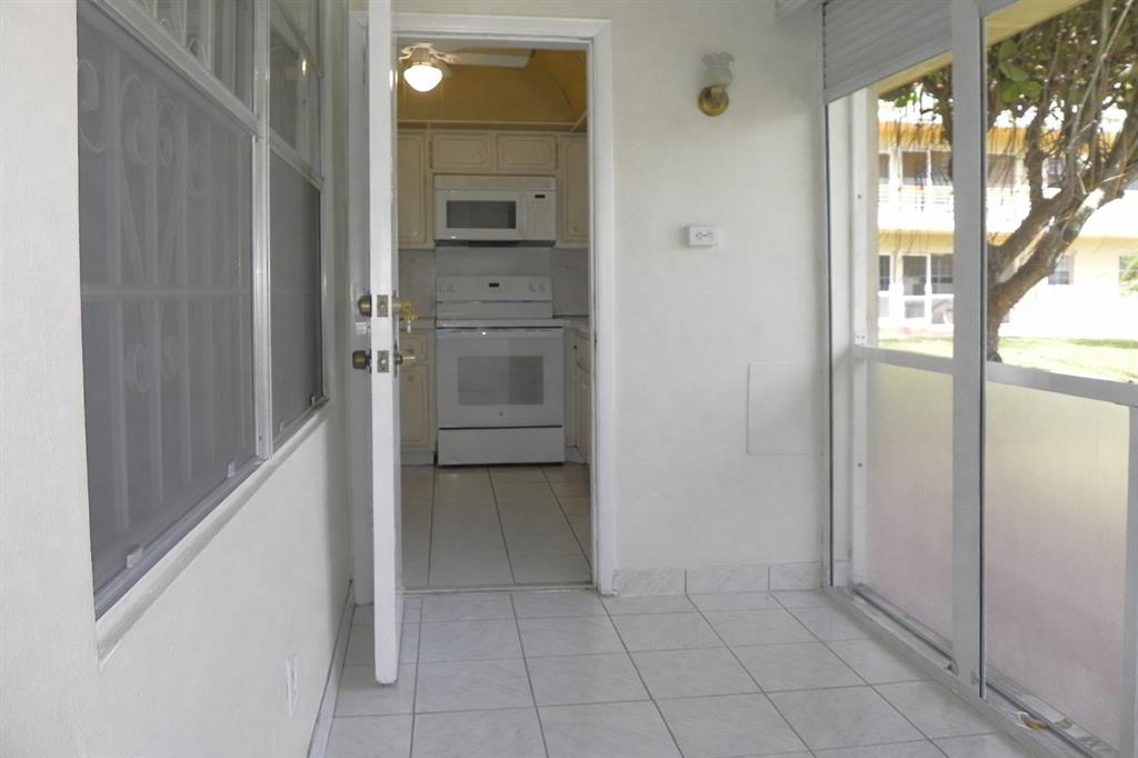 5300 Washington Street, Unit 107D Hollywood, FL 33021 - Photo 14 of 23 a view of walk in closet with a fireplace
