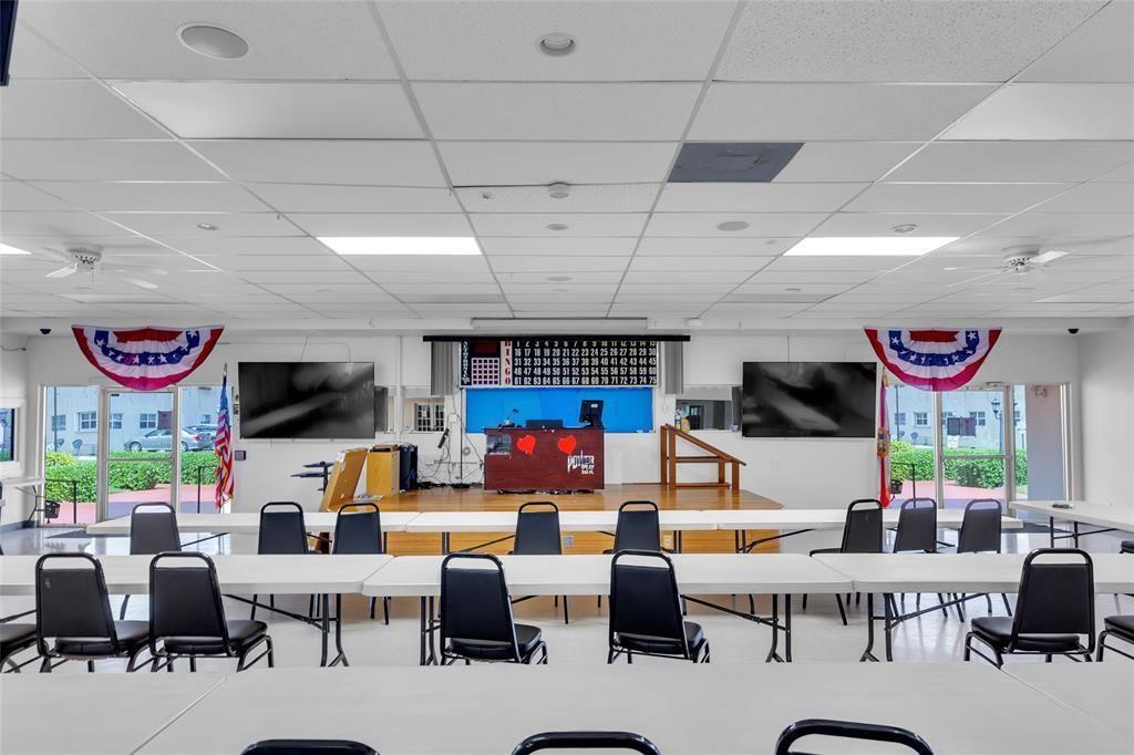 5300 Washington Street, Unit 107D Hollywood, FL 33021 - Photo 21 of 23 a living room with fireplace furniture and a flat screen tv