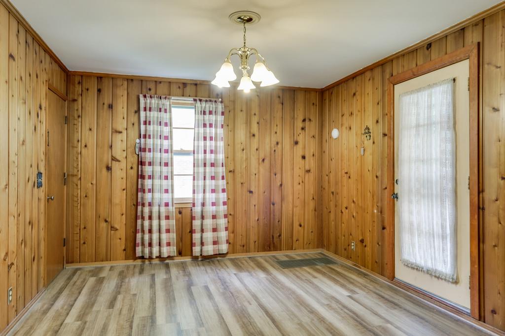 851 Reeves Road Antioch, TN 37013 - Photo 11 of 25 a view of a bathroom with a shower curtain and a chandelier