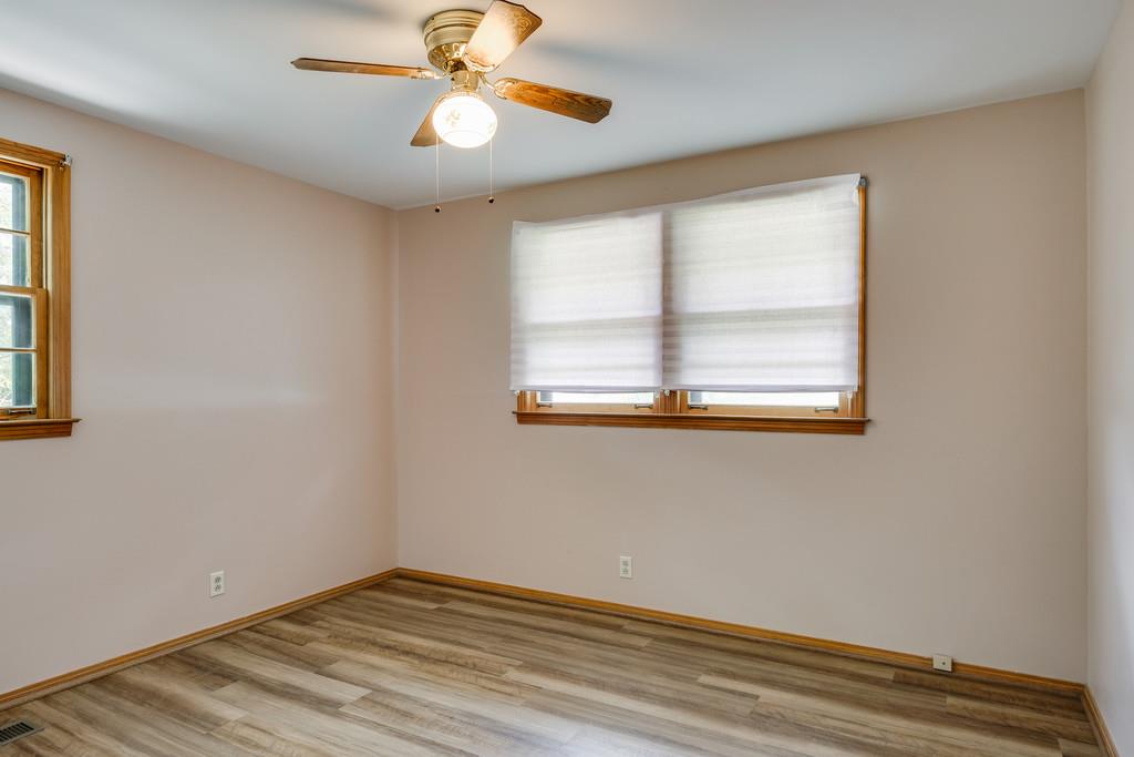 851 Reeves Road Antioch, TN 37013 - Photo 13 of 25 a view of an empty room with window and wooden floor