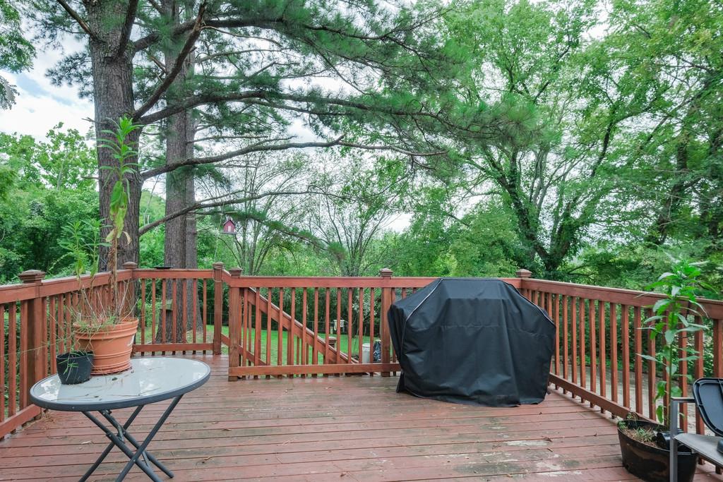 851 Reeves Road Antioch, TN 37013 - Photo 23 of 25 a view of a table and chairs on the roof deck