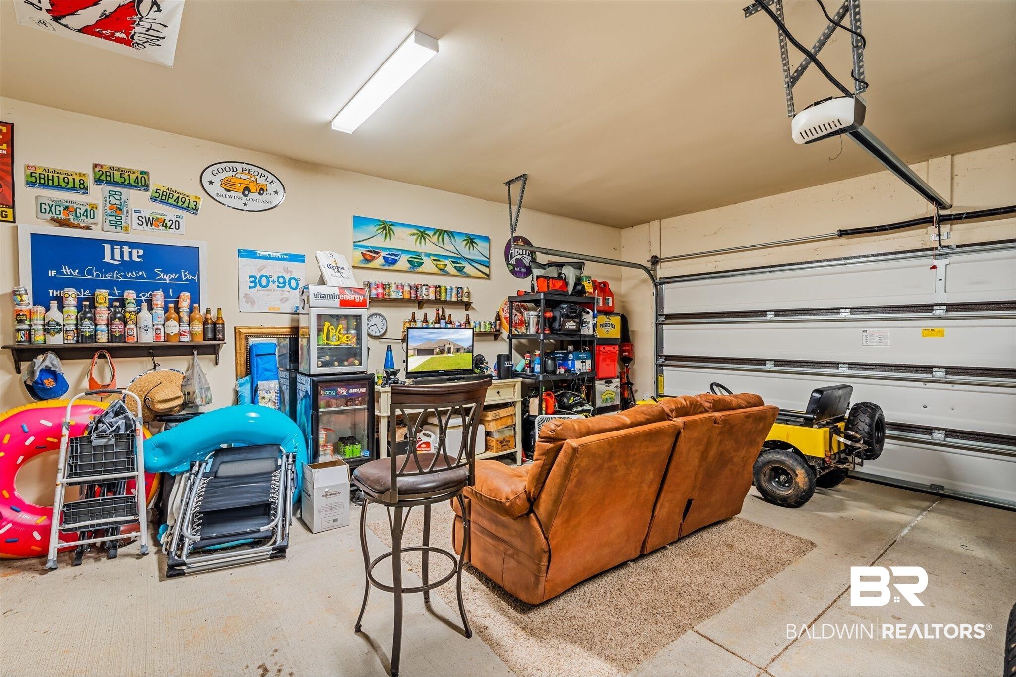 9912 Dunleith Loop Daphne, AL 36526 - Photo 18 of 23 Garage featuring a garage door opener