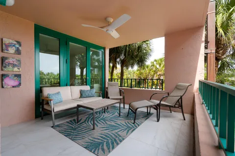a outdoor space with patio the couches and a dining table with garden view