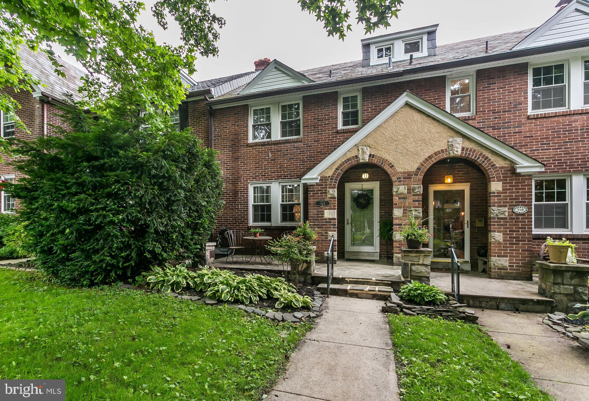 314 Dunkirk Road Baltimore, MD 21212 - Photo 2 of 28 a front view of a house with a garden