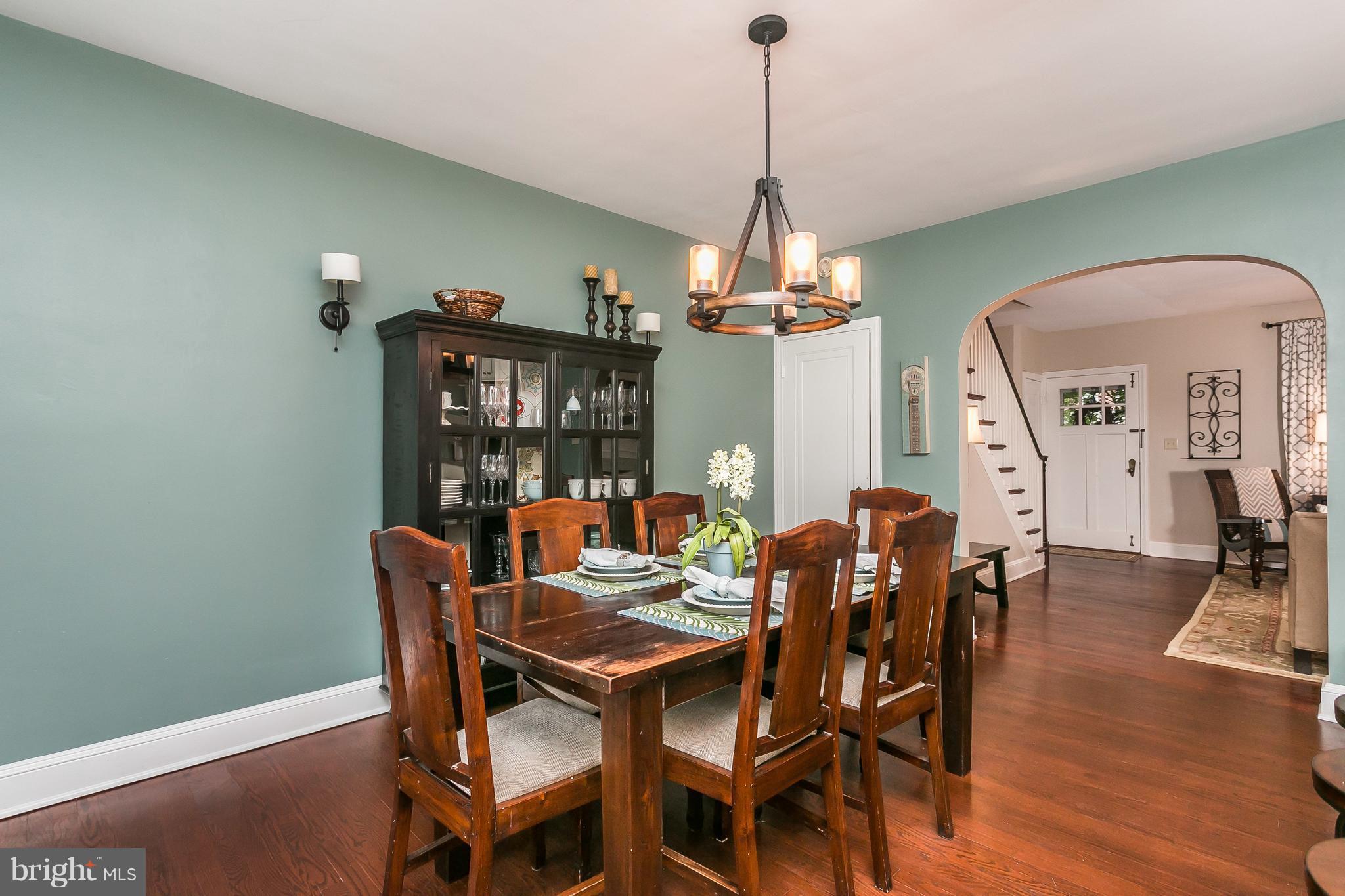 314 Dunkirk Road Baltimore, MD 21212 - Photo 13 of 28 a view of a dining room with furniture wooden floor and chandelier