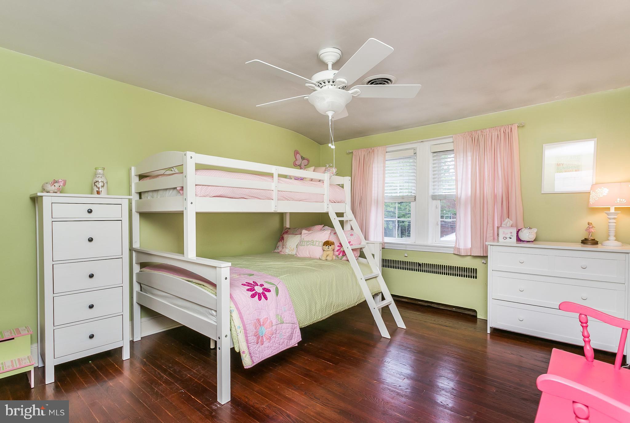 314 Dunkirk Road Baltimore, MD 21212 - Photo 14 of 28 a bedroom with a bed and a chandelier