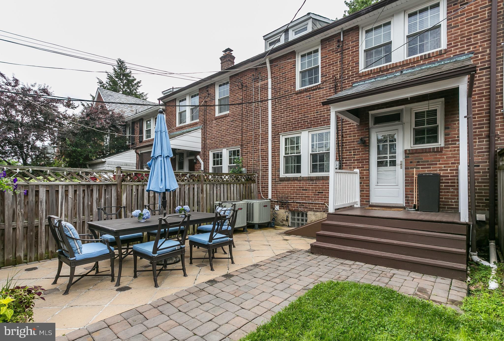 314 Dunkirk Road Baltimore, MD 21212 - Photo 28 of 28 a view of a brick house with a chairs in patio