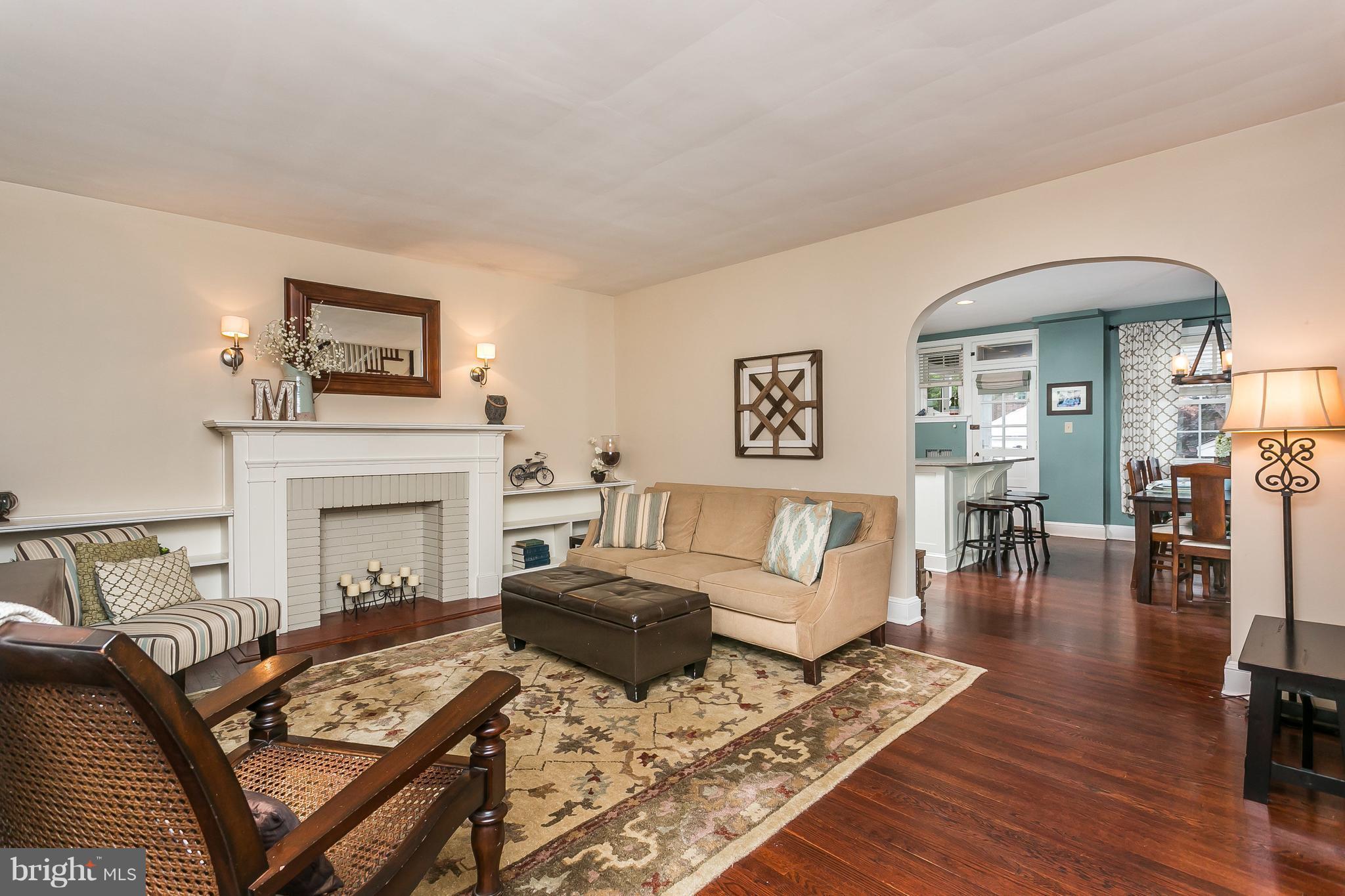 314 Dunkirk Road Baltimore, MD 21212 - Photo 4 of 28 a living room with furniture and a fireplace