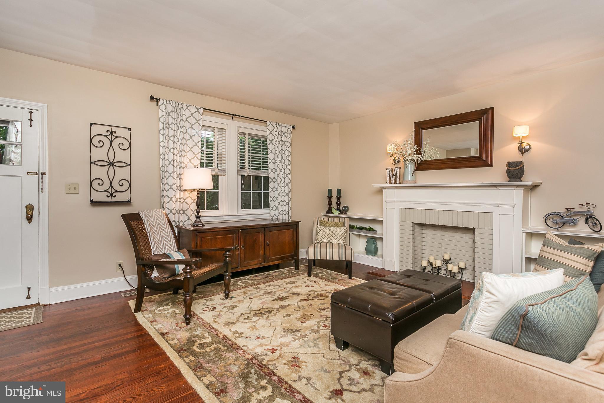 314 Dunkirk Road Baltimore, MD 21212 - Photo 6 of 28 a living room with furniture and a fireplace