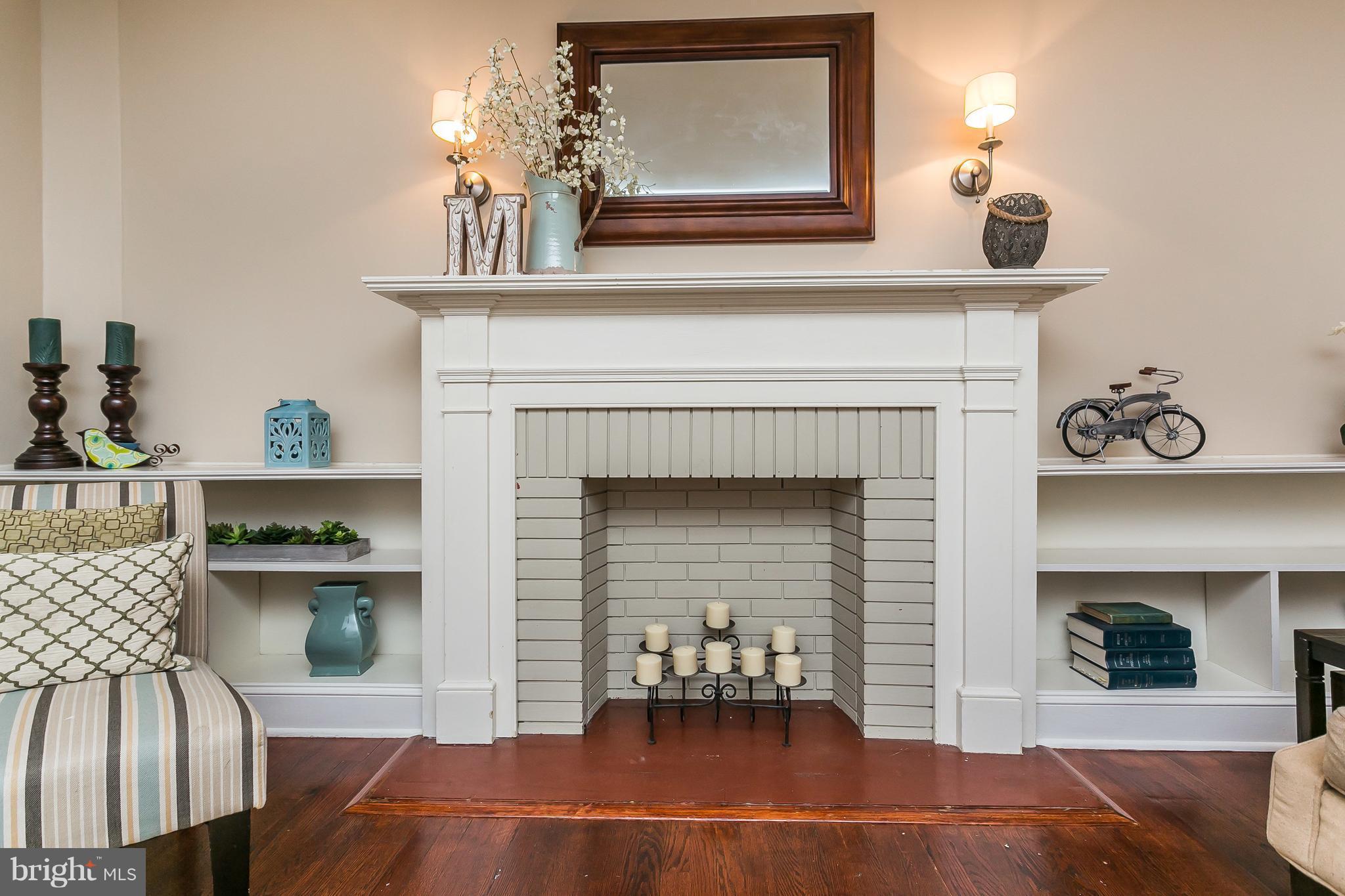 314 Dunkirk Road Baltimore, MD 21212 - Photo 9 of 28 a living room with furniture and a fireplace