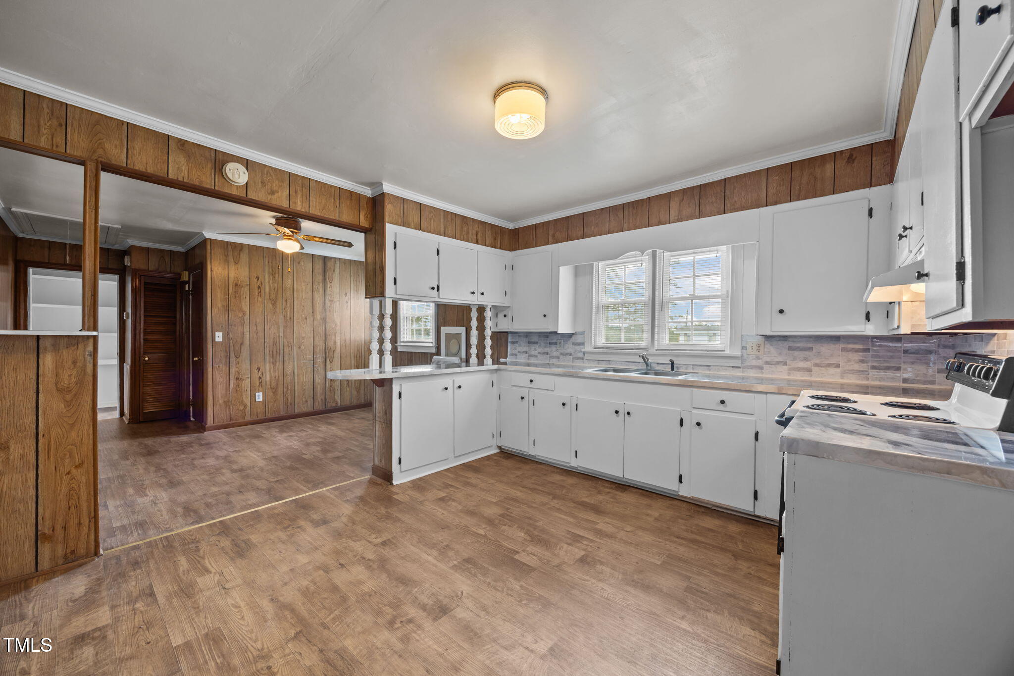 6590 Hassell Road Robersonville, NC 27871 - Photo 11 of 42 a large kitchen with cabinets and stainless steel appliances