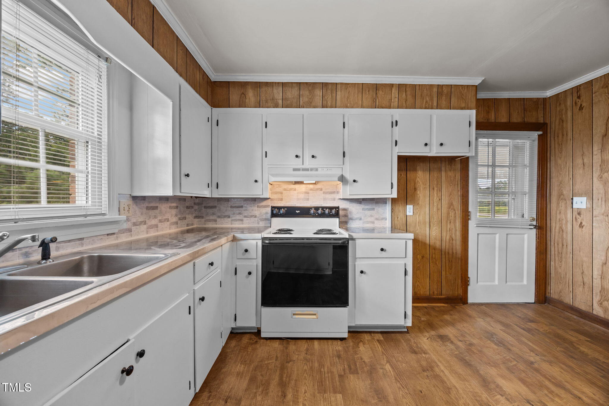 6590 Hassell Road Robersonville, NC 27871 - Photo 14 of 42 a kitchen with stainless steel appliances a stove a sink and a refrigerator