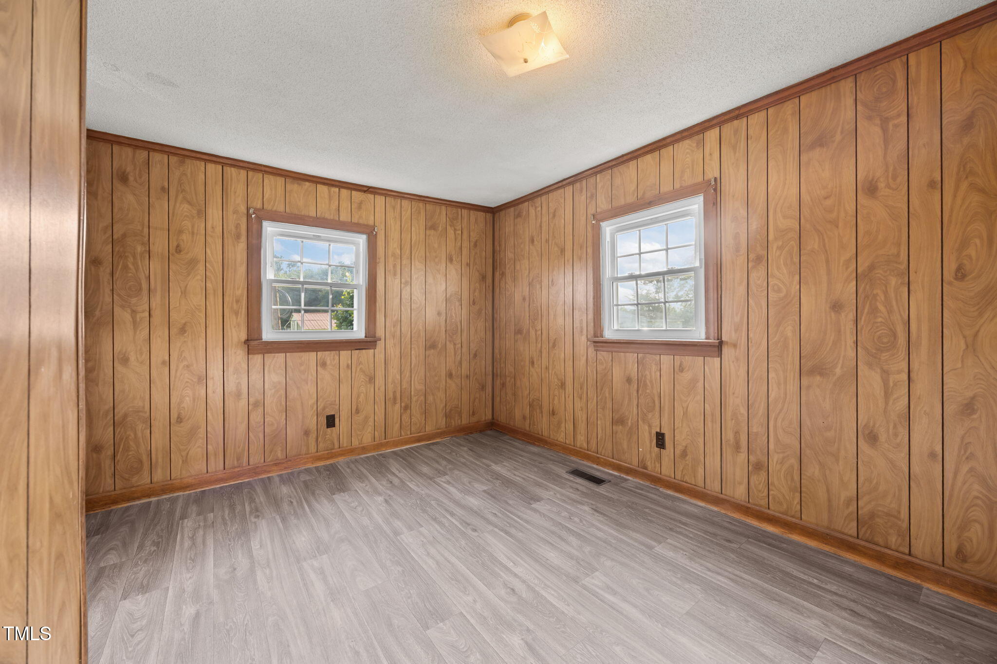 6590 Hassell Road Robersonville, NC 27871 - Photo 22 of 42 an empty room with windows