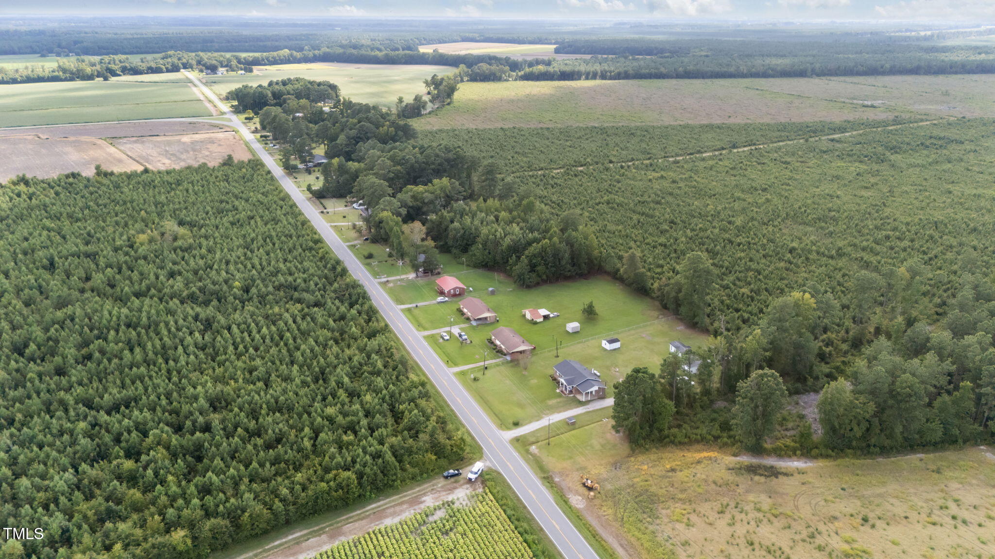 6590 Hassell Road Robersonville, NC 27871 - Photo 34 of 42 a view of a balcony with floor to ceiling windows with outdoor space
