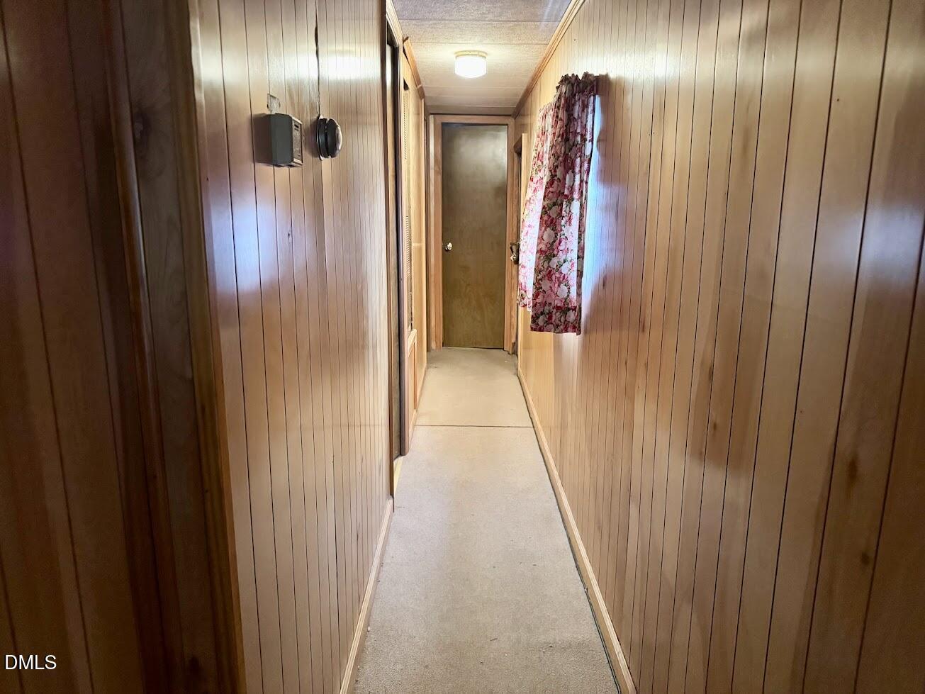6590 Hassell Road Robersonville, NC 27871 - Photo 38 of 42 a view of a hallway with wooden floor