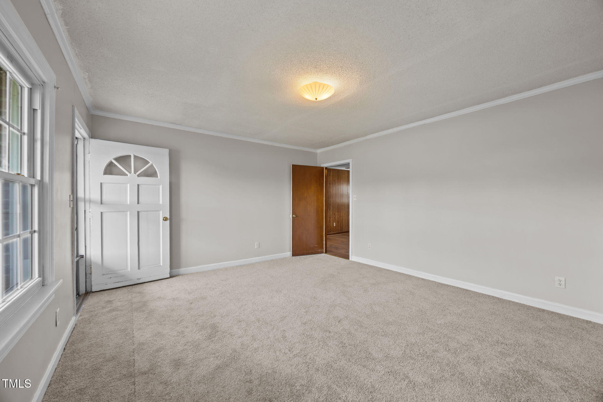 6590 Hassell Road Robersonville, NC 27871 - Photo 6 of 42 an empty room with windows and closet