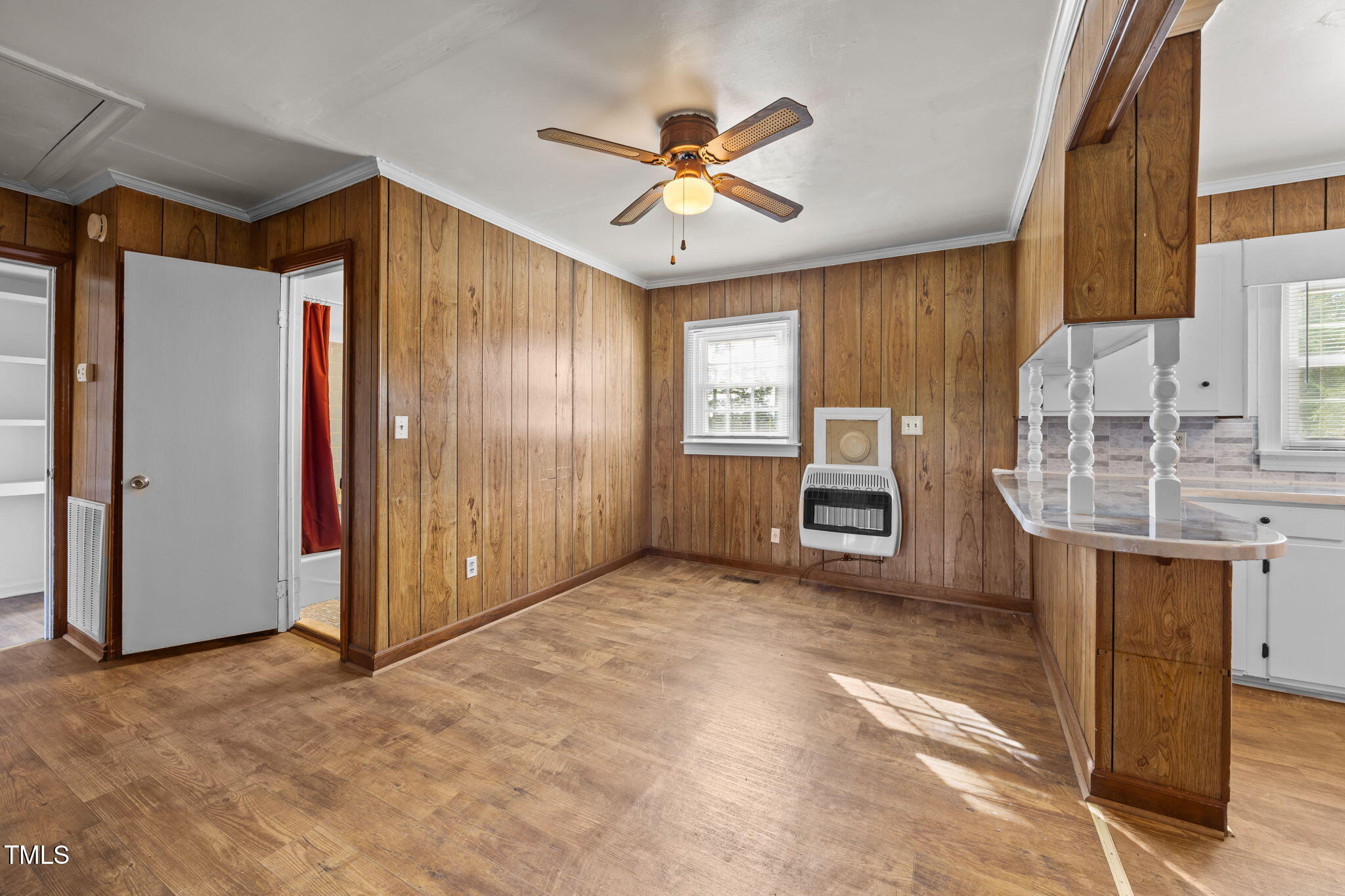 6590 Hassell Road Robersonville, NC 27871 - Photo 7 of 42 a view of a livingroom with a fireplace and a ceiling fan