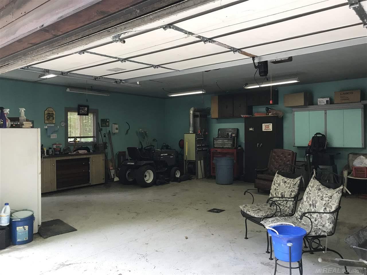 4100 School Road Roscommon, MI 48653 - Photo 34 of 39 With heat and work area. Garage items are negotiable.