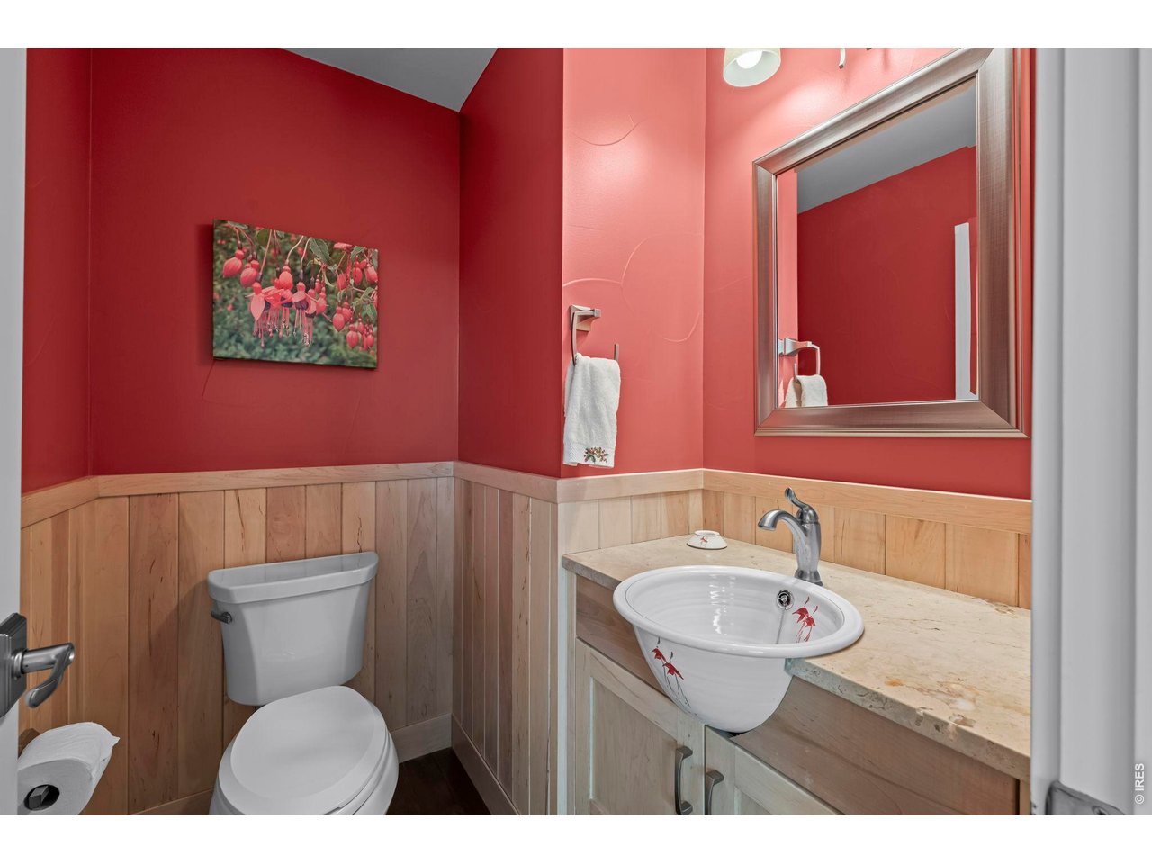 4824 Briar Ridge Court Boulder, CO 80301 - Photo 21 of 40 a bathroom with a toilet a sink and mirror