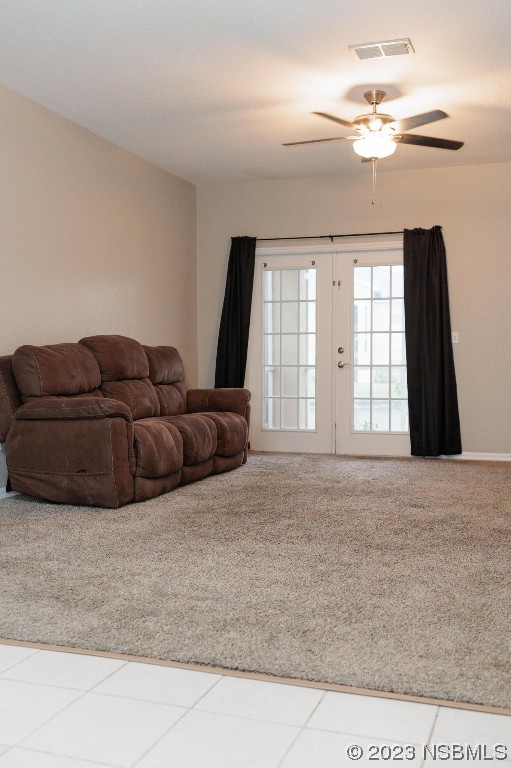 830 Airport Road, Unit 305 Port Orange, FL 32128 - Photo 11 of 27 a living room with furniture and a window