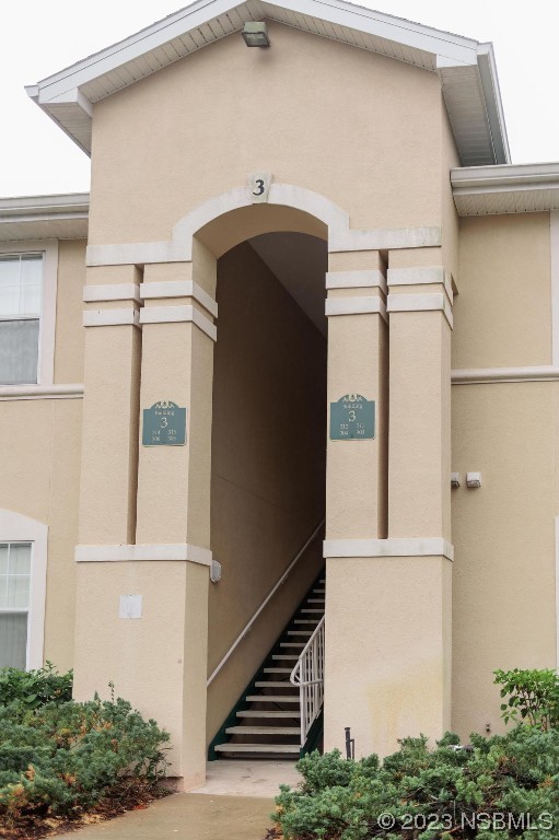 830 Airport Road, Unit 305 Port Orange, FL 32128 - Photo 2 of 27 a view of a balcony with a door