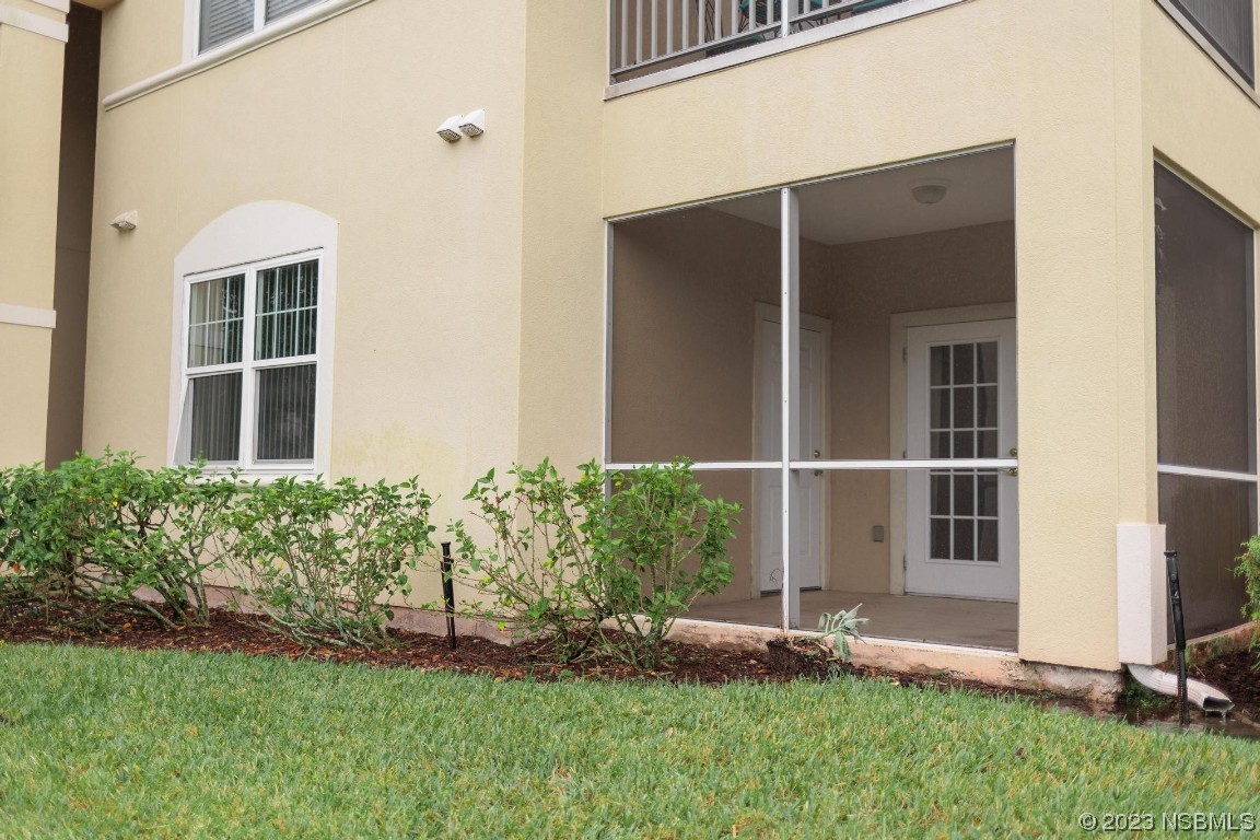 830 Airport Road, Unit 305 Port Orange, FL 32128 - Photo 27 of 27 a view of backyard with garden