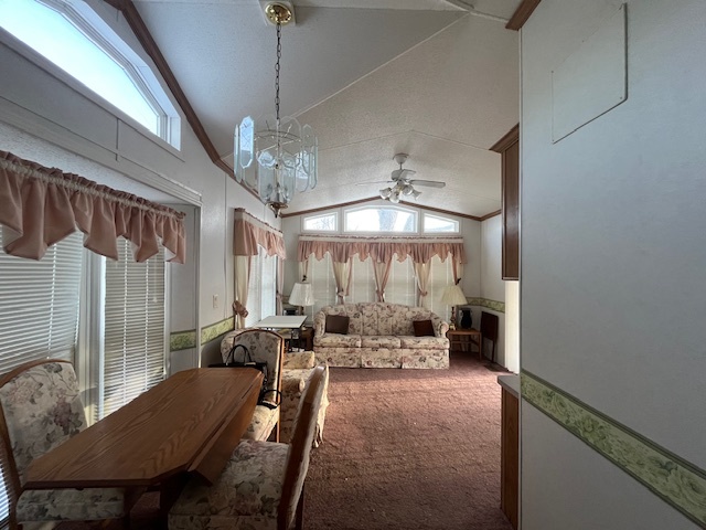 2795 East 28th Road Marseilles, IL 61341 - Photo 8 of 57 a living room with furniture and a chandelier