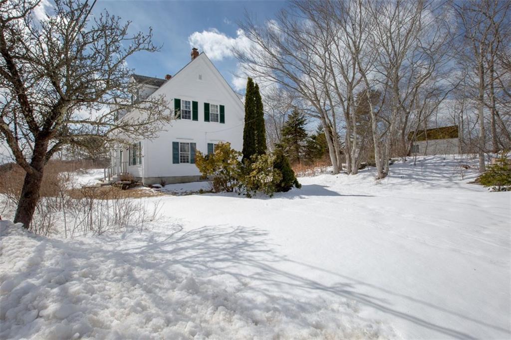 950 Cundy's Harbor Road Harpswell, ME 04079 - Photo 4 of 35 Driveway under the snow.