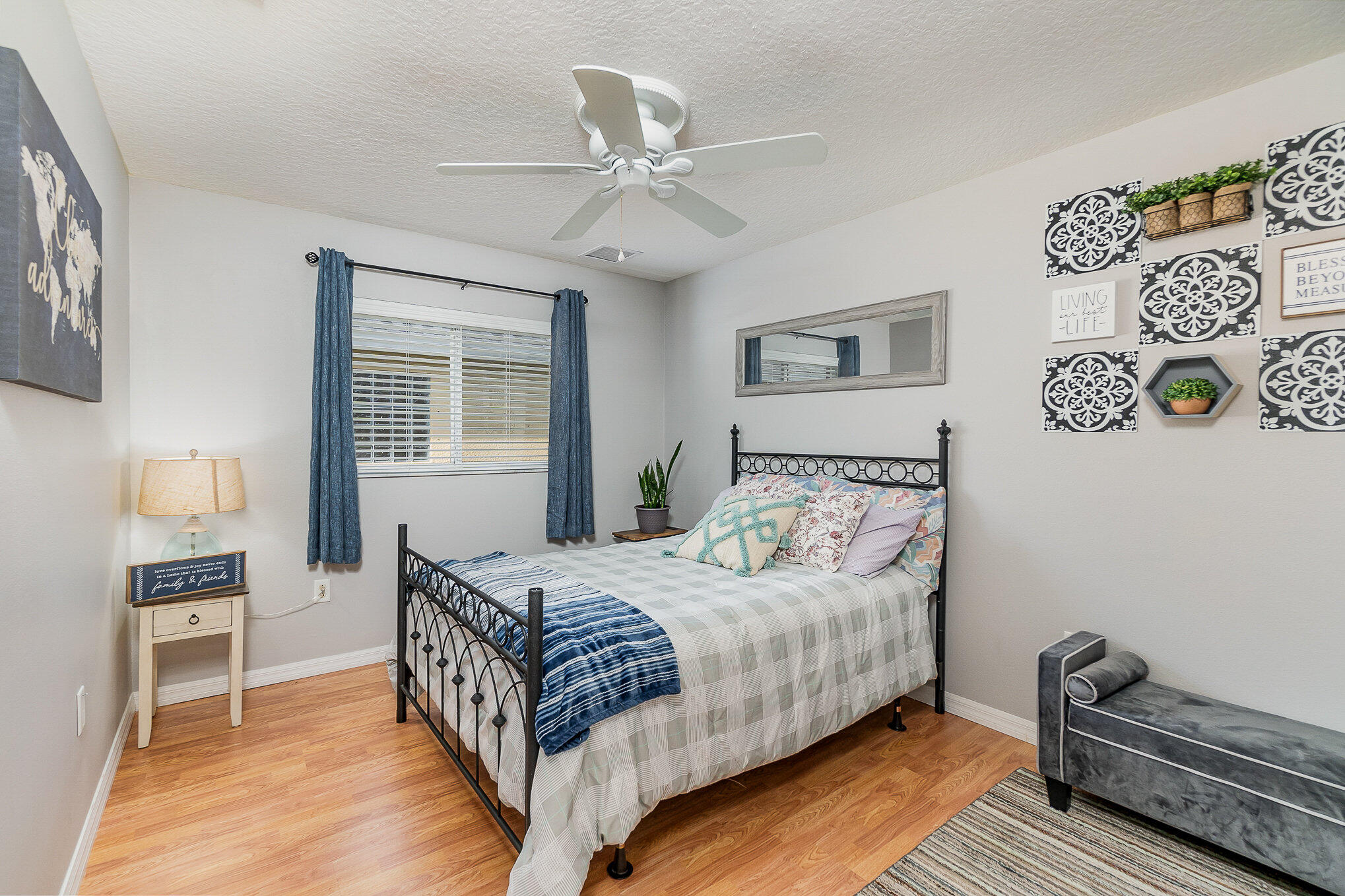 6914 Renshaw Drive Melbourne, FL 32940 - Photo 20 of 27 a bedroom with a bed and window