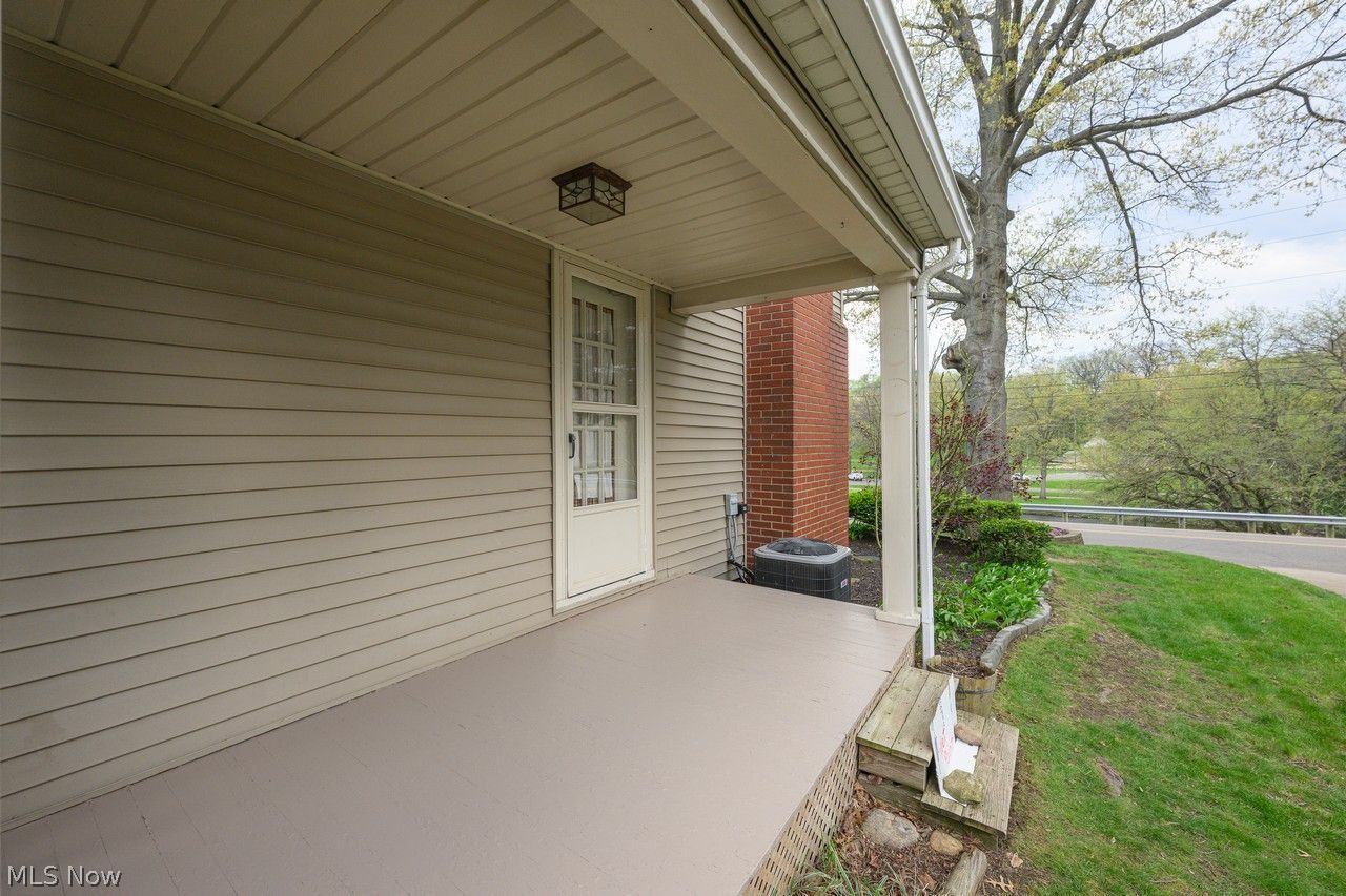 1422 Monument Road Northwest Canton, OH 44703 - Photo 25 of 31 Side covered patio area