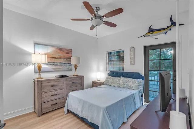 a kitchen with a table and chairs