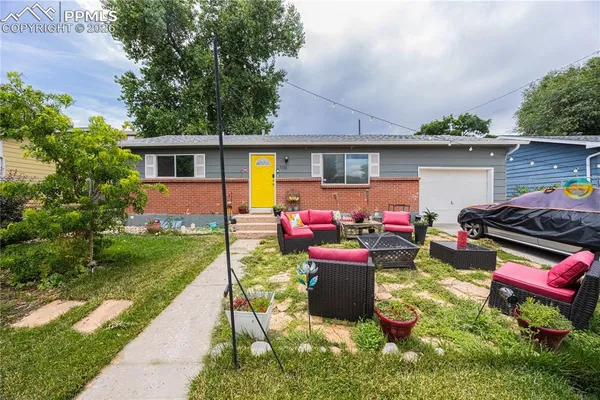 a front view of a house with patio