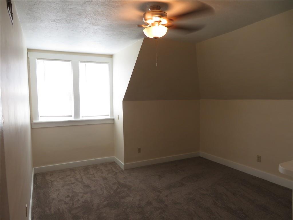 203 Main Street, Unit 3A Lyndora, PA 16045 - Photo 5 of 7 en empty room with a window