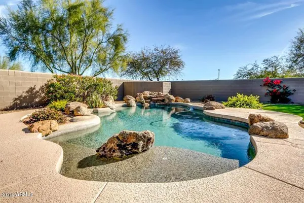 a view of a garden with a patio