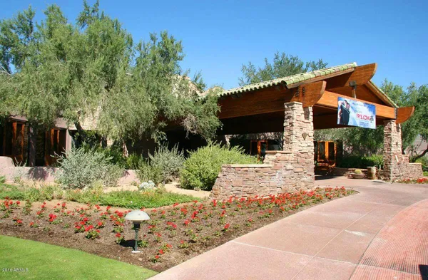 a view of house with yard