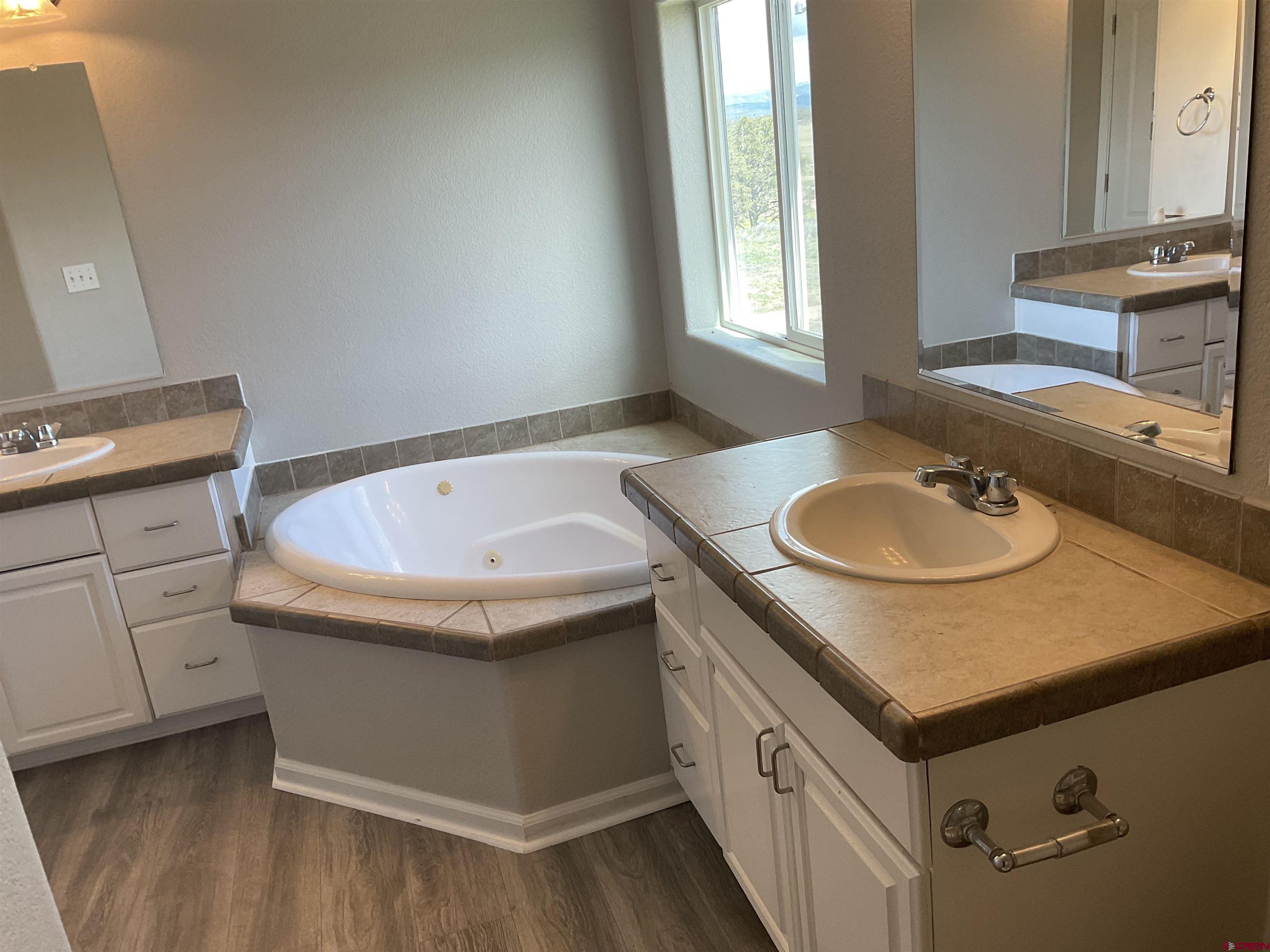 428 County Road 314 Ignacio, CO 81137 - Photo 22 of 24 a bathroom with a sink and a bathtub