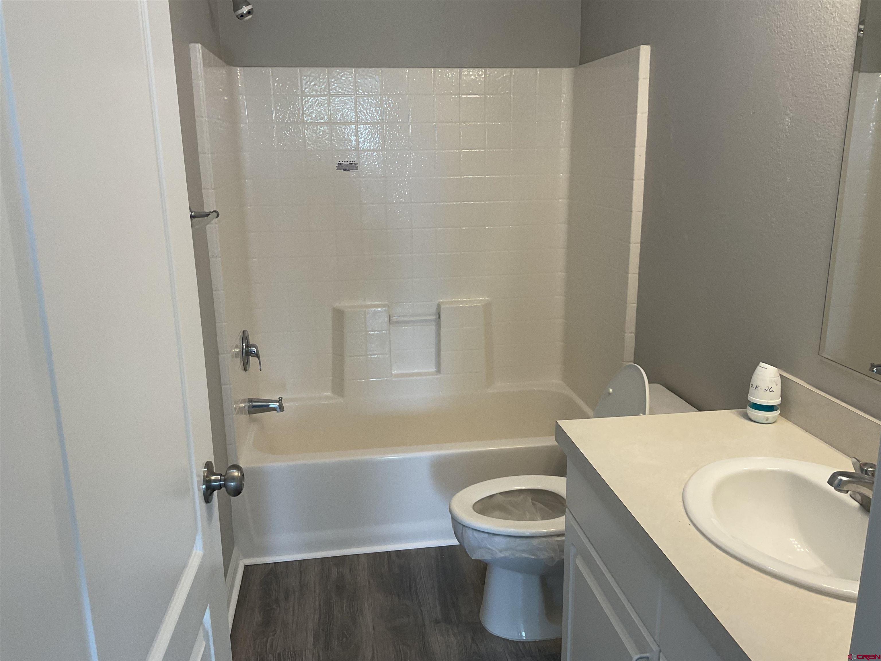428 County Road 314 Ignacio, CO 81137 - Photo 24 of 24 a bathroom with a sink a toilet and shower