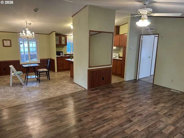 a view of a kitchen and dining room