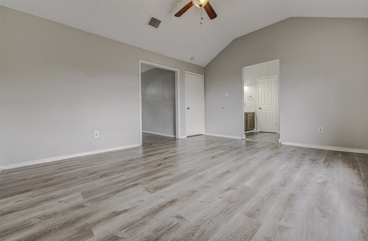 1401 Deepwoods Trail Leander, TX 78641 - Photo 16 of 34 a view of an empty room and wooden floor