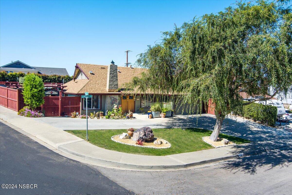 313 Somerset Place Lompoc, CA 93436 - Photo 2 of 59 a view of a swimming pool with a patio