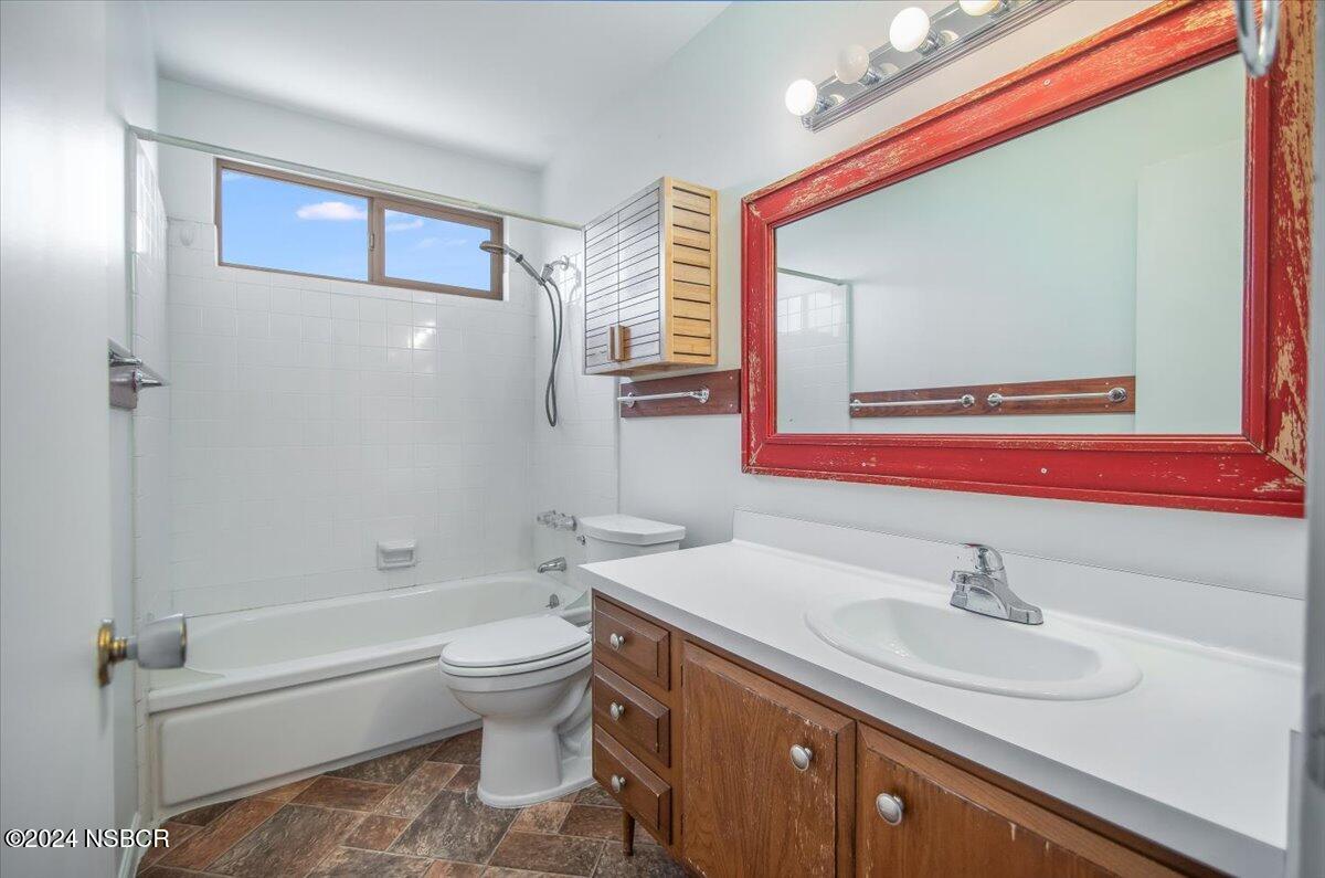313 Somerset Place Lompoc, CA 93436 - Photo 31 of 59 a bathroom with a sink a toilet and shower