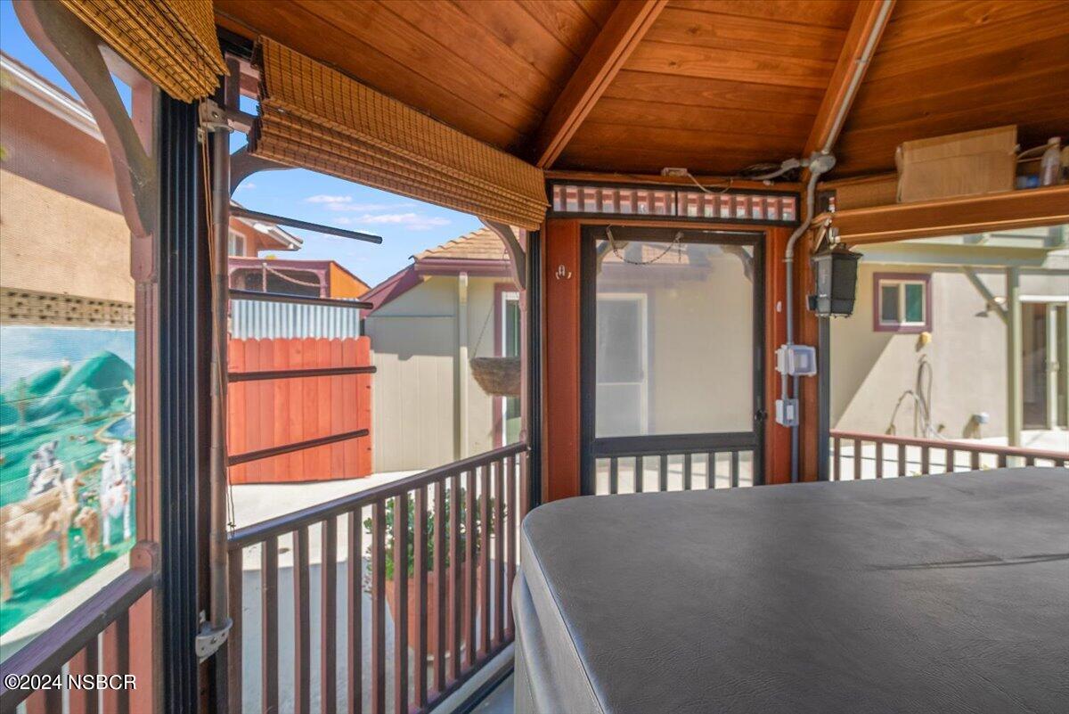313 Somerset Place Lompoc, CA 93436 - Photo 56 of 59 a view of a porch with a table and chairs