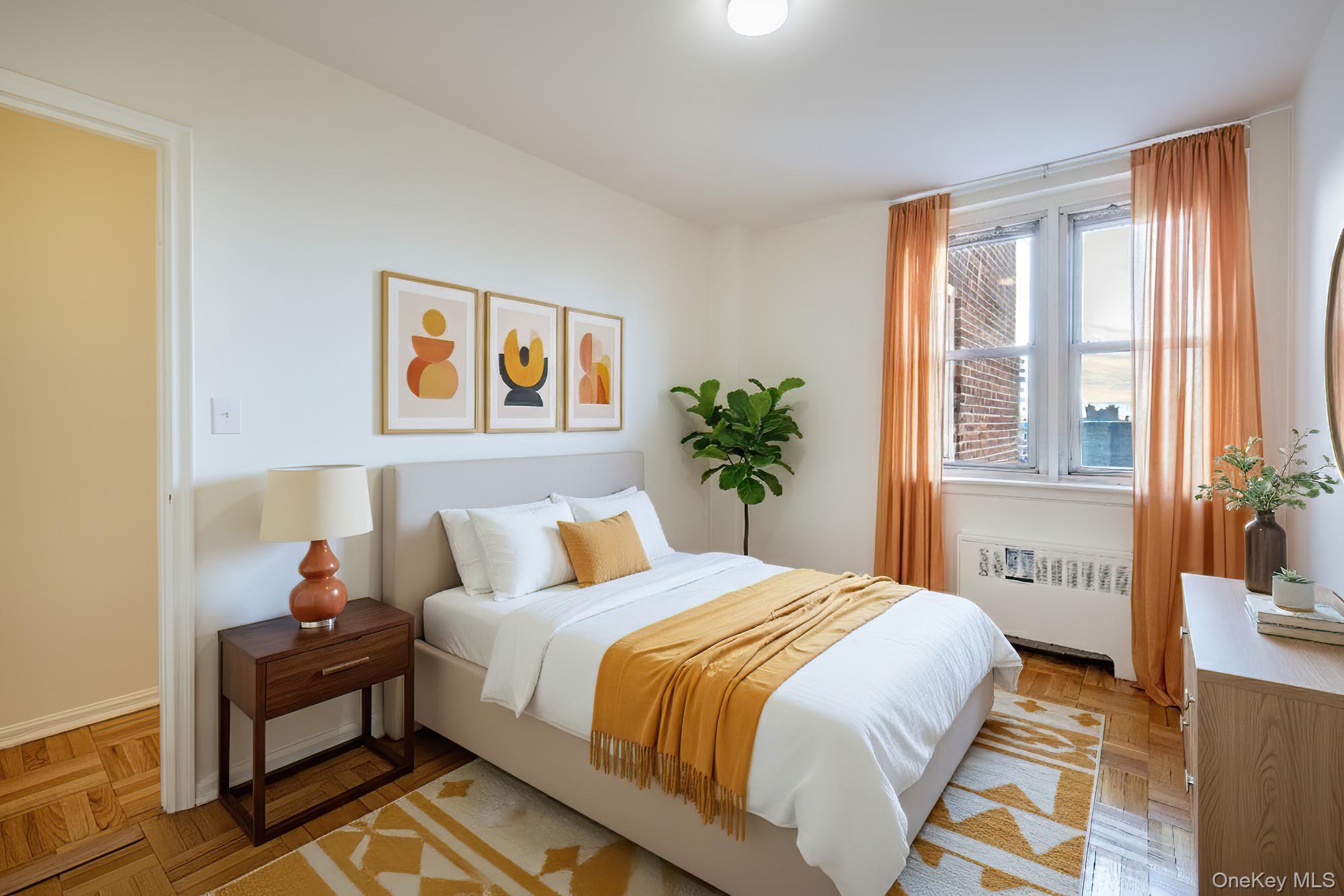 25 Knolls Crescent, Unit 8L Bronx, NY 10463 - Photo 12 of 21 Bedroom with radiator