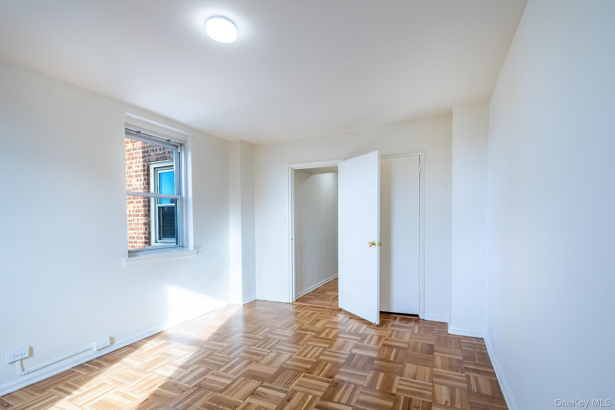 25 Knolls Crescent, Unit 8L Bronx, NY 10463 - Photo 14 of 21 Spare room with baseboards