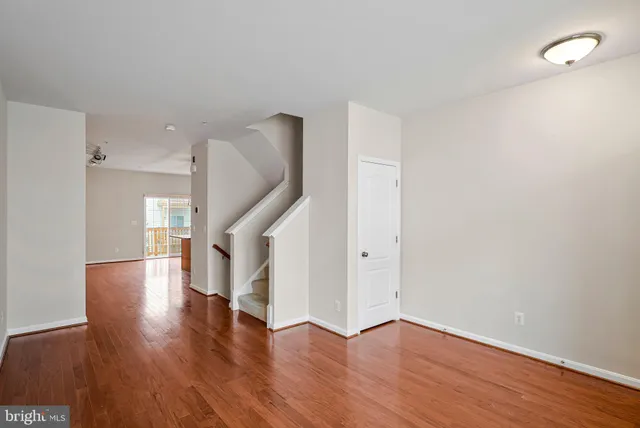 a view of entryway with wooden floor