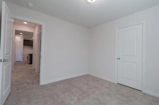 wooden floor and cabinet in an empty room