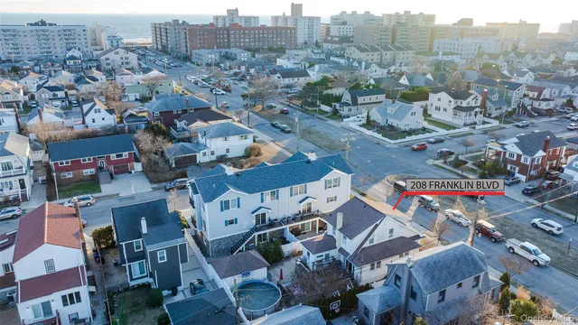 an aerial view of a city with lots of residential buildings